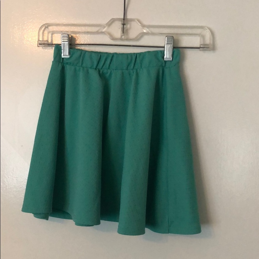 Teal green short skirt